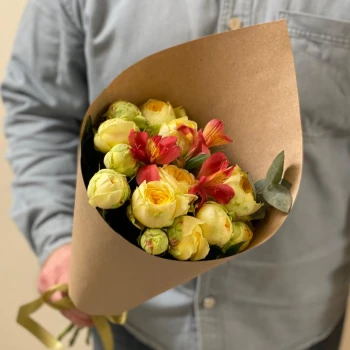 Author's bouquet of peony roses in craft packaging