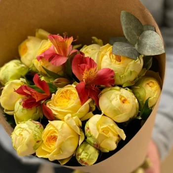 Author's bouquet of peony roses in craft packaging